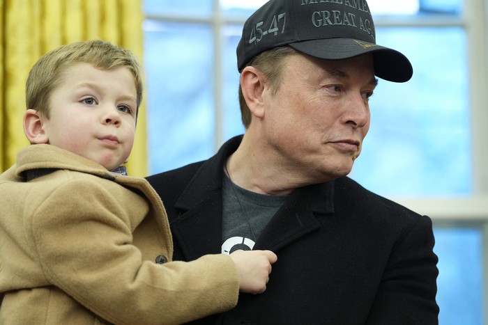 Elon Musk, joined by his son X Æ A-Xii, speaks in the Oval Office at the White House, Tuesday, Feb. 11, 2025, in Washington, during an event with President Donald Trump. (Photo/Alex Brandon)