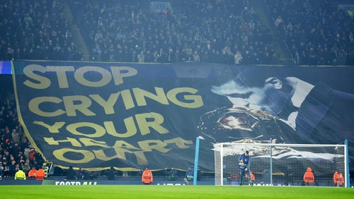 Soccer Football - Champions League - Knockout Phase Playoff - First Leg - Manchester City v Real Madrid - Etihad Stadium, Manchester, Britain - February 11, 2025  Manchester City fans display a Rodri banner inside the stadium before the match REUTERS/Phil Noble