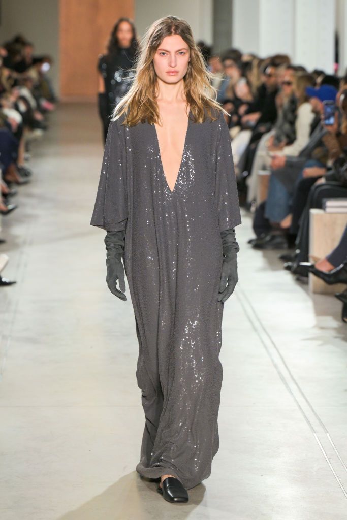 Model on the runway at the Michael Kors Fall RTW 2025 fashion show as part of New York Fashion Week held at the Terminal Warehouse on February 11, 2025 in New York, New York. (Photo by Giovanni Giannoni/WWD via Getty Images)