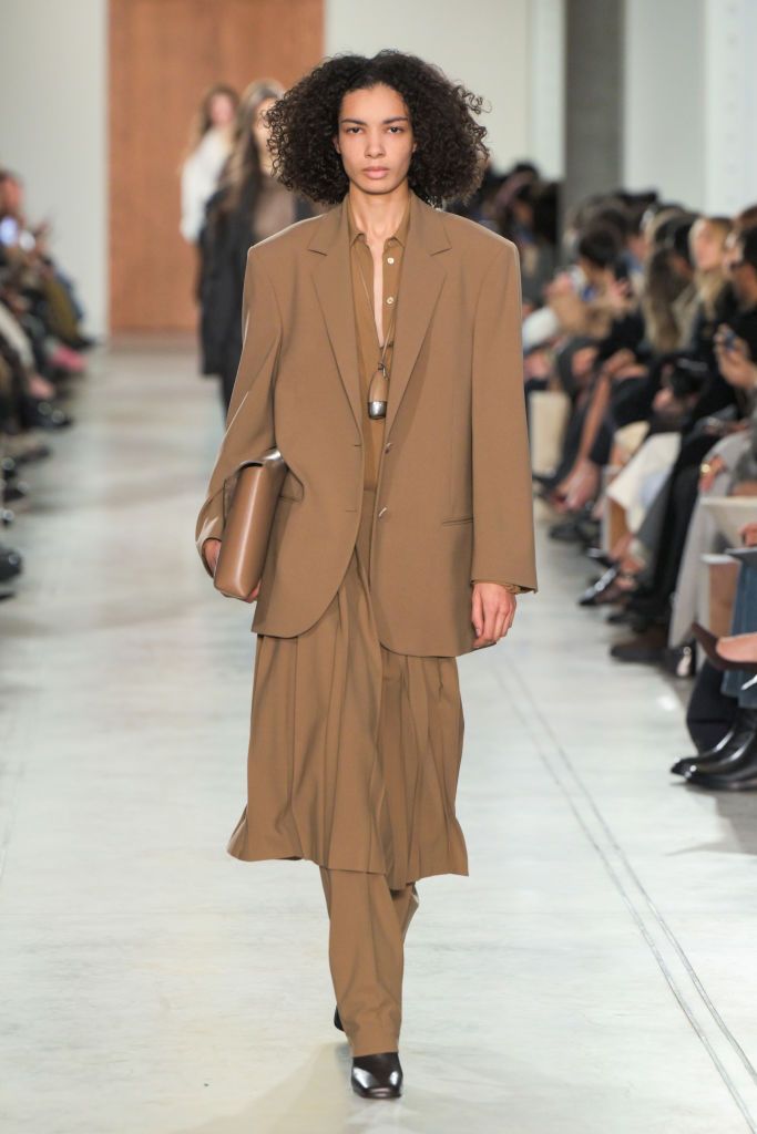 Model on the runway at the Michael Kors Fall RTW 2025 fashion show as part of New York Fashion Week held at the Terminal Warehouse on February 11, 2025 in New York, New York. (Photo by Giovanni Giannoni/WWD via Getty Images)