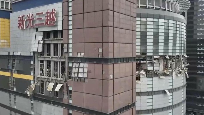 In this drone photo taken and released by National Fire Agency, the damaged facade is seen in the aftermath of an explosion at the Shin Kong Mitsukoshi department store in Taichung city in Taiwan on Thursday, Feb. 13, 2025. (National Fire Agency via AP)