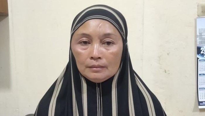 Tampang wanita berinisial MW (38) di Kabupaten Bone menjadi pelaku pembunuhan terhadap temannya sendiri Asima (38).
