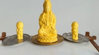 Karya mentega di galeri seni ini juga tampak artistik. Bentuknya menyerupai anak yang tengah berdoa dan patung dewa Budha. Foto: site news