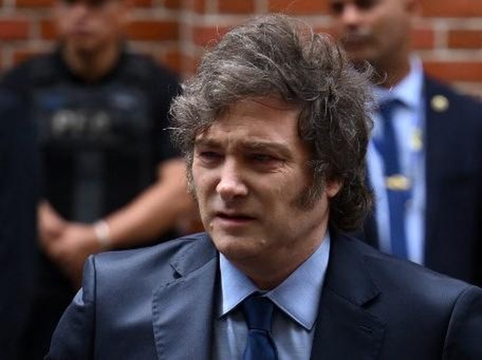 (FILES) Argentinas President Javier Milei leaves the Holocaust Museum after attending an event to commemorate International Holocaust Remembrance Day in Buenos Aires on January 27, 2025. Milei was facing criticism on February 15 after promoting a cr