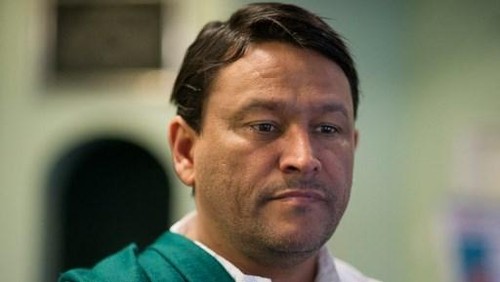 TO GO WITH AFP STORY BY RORY SHELDON
Imam Muhsin Hendricks gets ready for the start of the Jumuah prayer at the Inner Circle Mosque, in Wynberg, on September 2, 2016, in Cape Town.. Friday prayers at the Peoples Mosque in Cape Town looks like any other around the Islamic world, except in this South African city the imam is openly gay and the teaching promotes homosexual rights. It is a stance that provokes outrage from many Muslims, but Muhsin Hendricks has built up a small, loyal congregation by helping worshippers try to reconcile their sexuality and their religion. In 1996 Hendricks founded The Inner Circle, a support group for Muslims living in Cape Town who felt rejected due to their sexual orientation, which led to him setting up the mosque five years ago. (Photo by RODGER BOSCH / AFP)