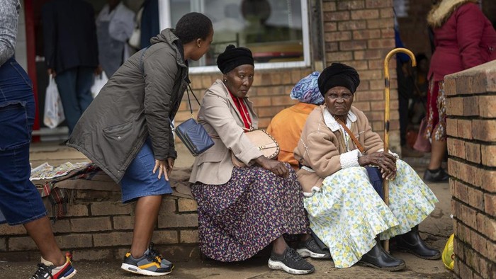 Nozuko Majola's grand mother sits in her Umzimkhulu home Tuesday, Nov. 11, 2025, affected by U.S. President Donald Trump's global foreign aid freeze, raising worries about HIV patients defaulting on treatment. (AP Photo/Jerome Delay)