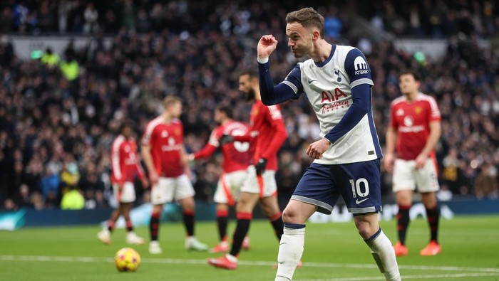 LONDON, ENGLAND - FEBRUARY 16: Tottenham Hotspurs James Maddison celebrates scoring his sides first goal during the Premier League match between Tottenham Hotspur FC and Manchester United FC at Tottenham Hotspur Stadium on February 16, 2025 in London, England. (Photo by Rob Newell - CameraSport via Getty Images)