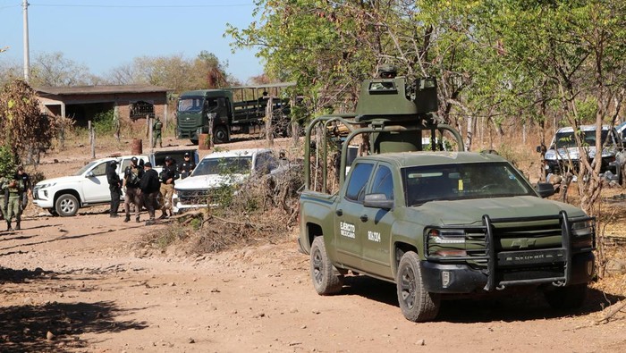 Members of security forces work at a site which was used as laboratories, precursor storage centers and warehouses during an operation by the Mexican army personnel where over 4 tonnes of methamphetamines were seized, in the community of Higueras de Abuya, in Sinaloa, Mexico February 16, 2025. REUTERS/Jesus Bustamante