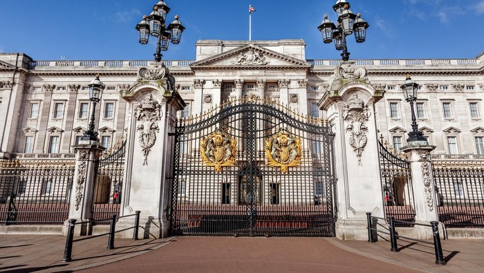London, UK - 26th April 2018: The front of Buckingham Palace in the morning at sunrise with nobody around