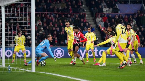 EINDHOVEN, NETHERLANDS - FEBRUARY 19: Ryan Flamingo of PSV Eindhoven scores his teams third goal during the UEFA Champions League 2024/25 League Knockout Play-off second leg match between PSV and Juventus at PSV Stadion on February 19, 2025 in Eindhoven, Netherlands. (Photo by Pau Barrena - UEFA/UEFA via Getty Images)