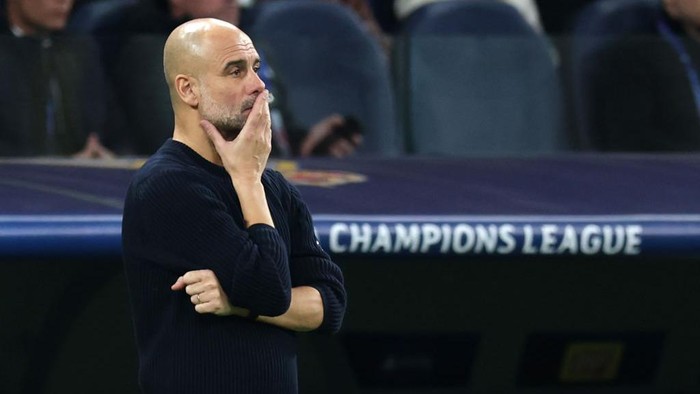 MADRID, SPAIN - FEBRUARY 19: Pep Guardiola, Manager of Manchester City, looks dejected during the UEFA Champions League 2024/25 League Knockout Play-off second leg match between Real Madrid C.F. and Manchester City at Santiago Bernabeu Stadium on February 19, 2025 in Madrid, Spain. (Photo by Clive Brunskill/Getty Images)