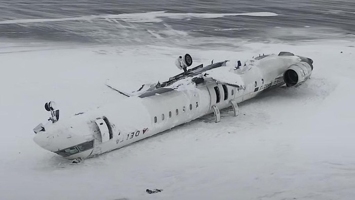This image taken from video released by the Transportation Safety Board of Canada on Wednesday, Feb. 19, 2025, shows the crashed plane of Delta flight 4819 at Toronto Pearson International Airport, in Mississauga, Ontario, on Tuesday, Feb. 18. (Transportation Safety Board of Canada via AP)