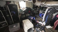 Salah satu basement rumah warga tampak berantakan akibat banjir di Detroit, AS, Rabu (19/2/2025).