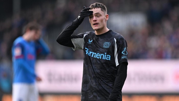 KIEL, GERMANY - FEBRUARY 22: Florian Wirtz of Bayer 04 Leverkusen reacts during the Bundesliga match between Holstein Kiel and Bayer 04 Leverkusen at Holstein-Stadion on February 22, 2025 in Kiel, Germany. (Photo by Oliver Hardt/Getty Images)