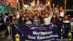Kemeriahan Pawai Obor Sambut Ramadan di Cilincing