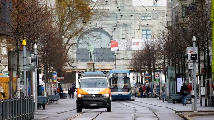 A Swiss police van is seen on a street in Zurich, Switzerland February 17, 2021. REUTERS/Arnd Wiegmann/File Photo Purchase Licensing Rights