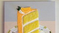 Kue varian jeruk ini juga tampak nyata dibuat oleh Rios dari kreasi bordir. Ia menampilkan kue 3 lapis berwarna kuning cerah lengkap dengan olesan krim putih dan oranye. Foto: Instagram @heather_rios_arte