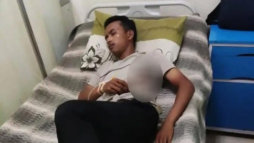 Muamar, kurir paket yang menjadi korban terkena peluru nyasar dirawat di RSUD Bima, Selasa (25/2/2025). (Foto: Istimewa)