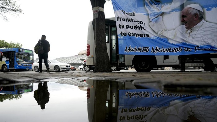 People attend a Mass to pray for Pope Francis' health in Constitution square in Buenos Aires, Argentina, Monday, Feb. 24, 2025. (AP Photo/Natacha Pisarenko)