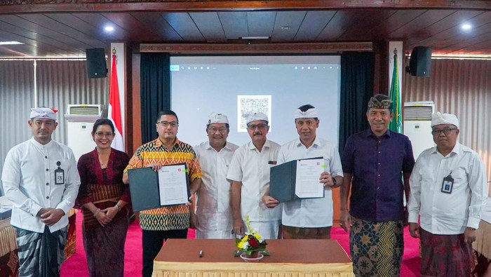 Acara penandatanganan kerja sama BPD Bali dengan DOKU di kantor pusat Bank BPD Bali, Denpasar. (IST)