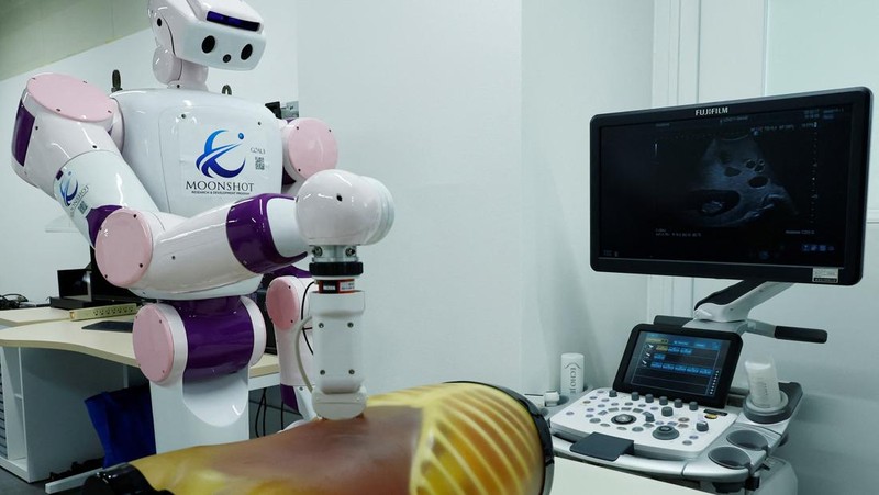 Waseda University professor Shigeki Sugano talks about AIREC, an artificial intelligence (AI)-driven humanoid robot, at the university's laboratory in Tokyo, Japan February 17, 2025. REUTERS/Kim Kyung-Hoon