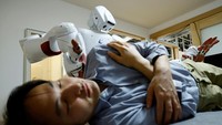 Waseda University professor Shigeki Sugano talks about AIREC, an artificial intelligence (AI)-driven humanoid robot, at the universitys laboratory in Tokyo, Japan February 17, 2025. REUTERS/Kim Kyung-Hoon