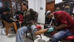 Warga Ikuti Layanan Hapus Tato jelang Ramadan