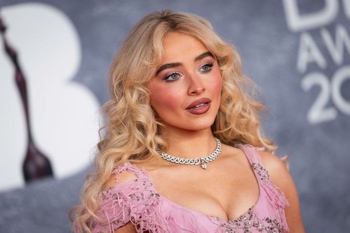 Sabrina Carpenter poses for photographers upon arrival at the Brit Awards 2025 in London, Saturday, March. 1, 2025. (Photo by Scott A Garfitt/Invision/AP)