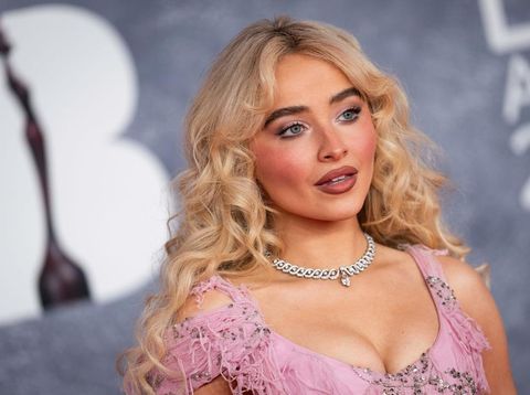 Sabrina Carpenter poses for photographers upon arrival at the Brit Awards 2025 in London, Saturday, March. 1, 2025. (Photo by Scott A Garfitt/Invision/AP)