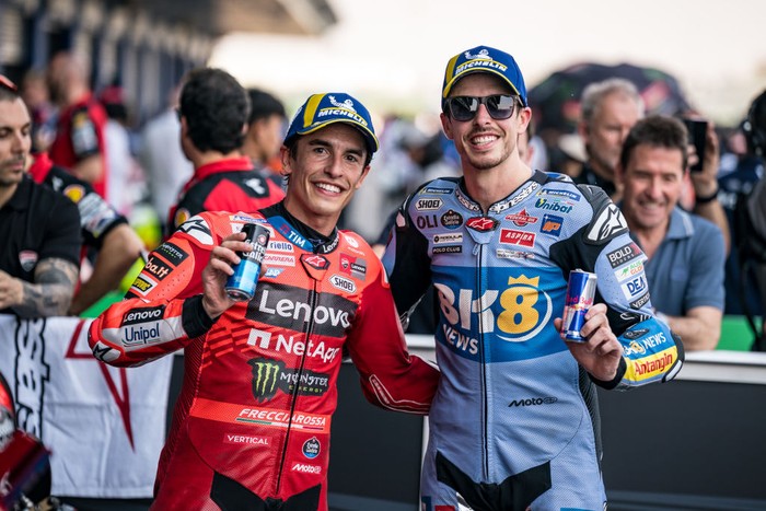 BURIRAM, THAILAND - MARCH 01: Double first row for the Marquez Brothers - Marc Marquez of Spain and Ducati Lenovo Team and Alex Marquez of Spain and Gresini Racing MotoGP™ at parc ferme during the qualifying of the MotoGP PT Grand Prix of Thailand at Chang International Circuit on March 01, 2025 in Buriram, Thailand. (Photo by Steve Wobser/Getty Images)