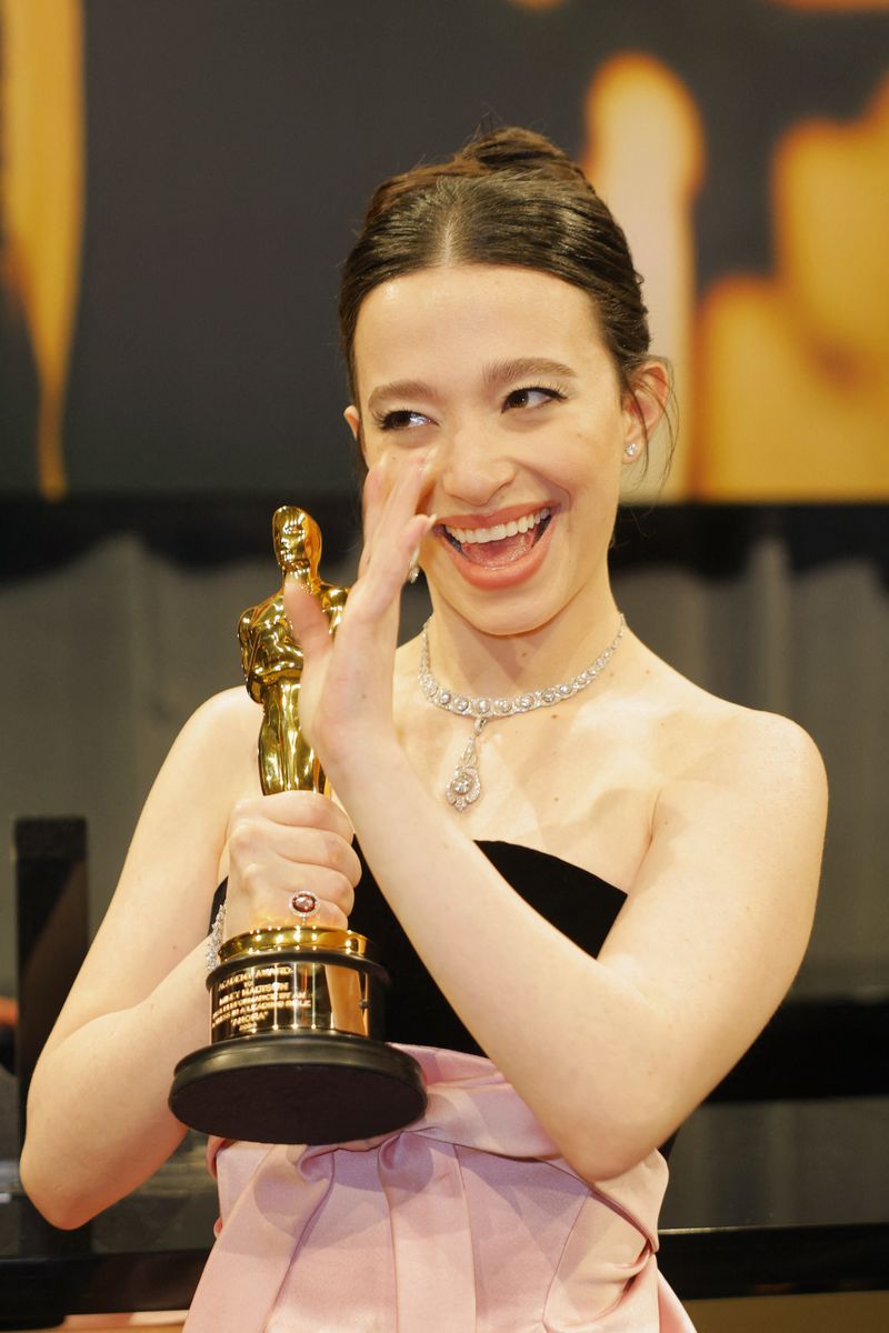 Mikey Madison poses with the Best Actress Oscar for 