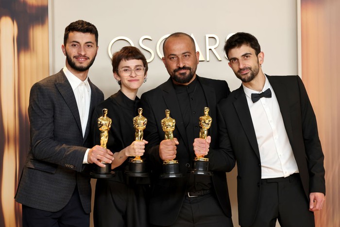 No Other Land HOLLYWOOD, CALIFORNIA - MARCH 02: (L-R) Basel Adra, Rachel Szor, Hamdan Ballal, Yuval Abraham, winners of the Best Documentary Feature Film for βNo Other Landβ, pose in the press room during the 97th Annual Oscars at Ovation Hollywood on March 02, 2025 in Hollywood, California. (Photo by Mike Coppola/Getty Images)