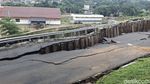 Potret Jalan ke Stasiun Batutulis Bogor Putus Akibat Longsor
