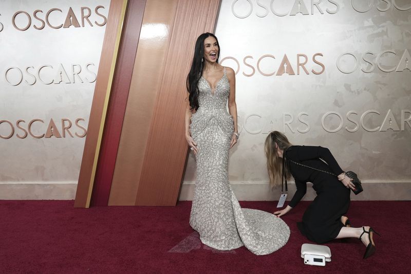 Demi Moore arrives at the Oscars on Sunday, March 2, 2025, at the Dolby Theatre in Los Angeles. (Photo by Jordan Strauss/Invision/AP)