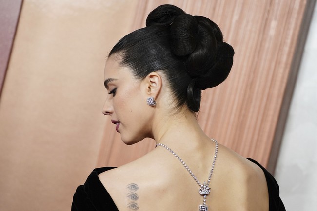 Margaret Qualley arrives at the Oscars on Sunday, March 2, 2025, at the Dolby Theatre in Los Angeles. (Photo by Jordan Strauss/Invision/AP)