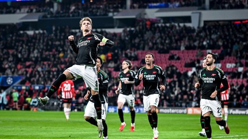 Arsenal midfielder Martin Odegaard celebrates the goal 1-4 during the match between PSV and Arsenal at the Philips Stadium for the UEFA Champions League Round of 16, 1st leg, season 2024-2025, in Eindhoven, Netherlands, on March 4, 2025. (Photo by Stefan Koops / EYE4images/NurPhoto via Getty Images)
