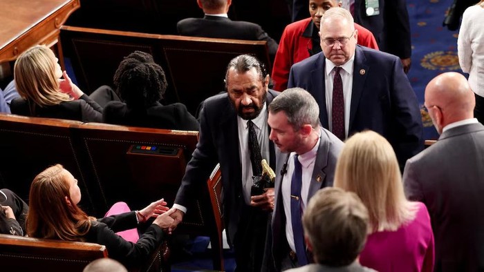 U.S. Rep. Al Green (D-TX) is escorted out after shouting during U.S. President Donald Trumps speech to a joint session of Congress, in the House Chamber of the U.S. Capitol in Washington, D.C., U.S., March 4, 2025. REUTERS/Kevin Lamarque Purchase Licensing Rights