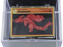 Unik Banget! Cheeto Bentuk Charizard Pokemon Laku Dilelang Rp 1,4 Miliar