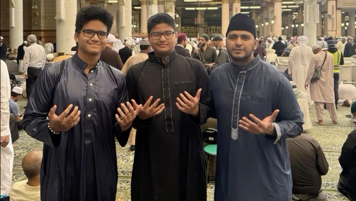 Ali Zainal bersama dua anaknya, Jibril dan Mikhail.