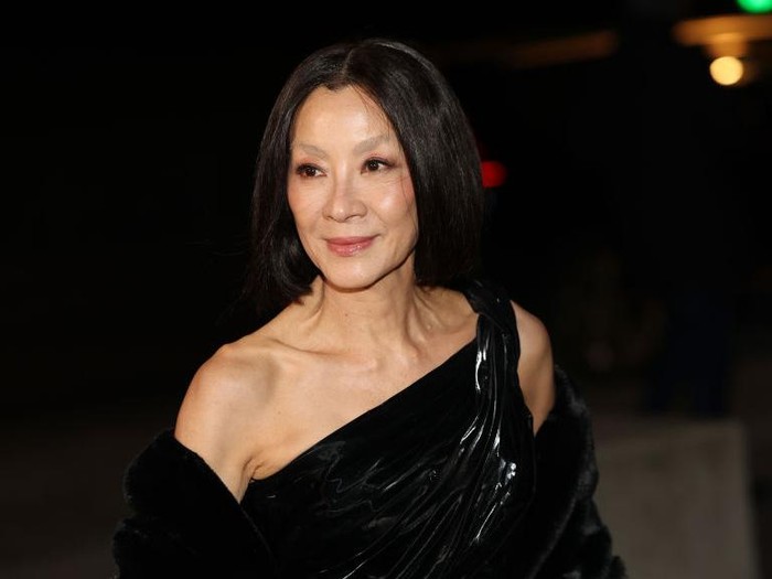 PARIS, FRANCE - MARCH 04: Michelle Yeoh attends the Le Grand Diner du Louvre Passage Richelieu Photocall at Musee du Louvre on March 04, 2025 in Paris, France. (Photo by Pascal Le Segretain/Getty Images)