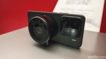 Sistem kamera konsep Optik Modular Xiaomi menampilkan lensa prime 35mm f/1.4 yang dapat dilepas. Lensa ini khusus buatan Xiaomi berkolaborasi dengan Leica. Foto: Fitraya Ramadhanny/detikINET