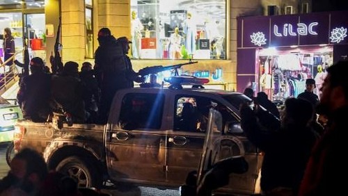Members of Syrias new security forces depart from the northwestern city of Idlib as reinforcement for the coastal area on March 8, 2025. Syrian security forces deployed heavily in the Alawite heartland on the countrys Mediterranean coast on March 8, after a war monitor reported that government and allied forces killed nearly 750 civilians from the religious minority in recent days. (Photo by Omar HAJ KADOUR / AFP)