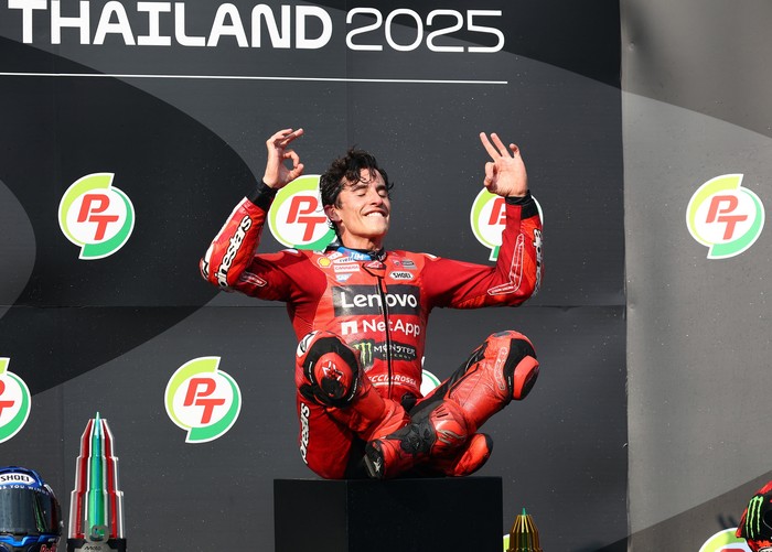 MotoGP - Thailand Grand Prix - Chang International Circuit, Buriram, Thailand - March 2, 2025 Ducati Lenovo Teams Marc Marquez celebrates on the podium after winning the MotoGP race REUTERS/Athit Perawongmetha