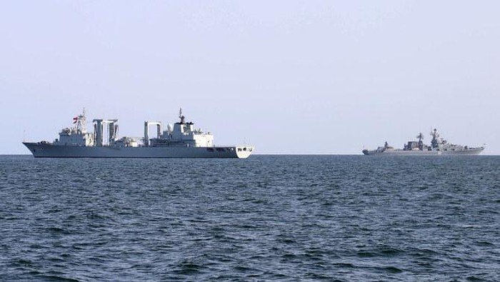 The Chinese Peoples Liberation Army Navy type 903A replenishment ship at sea during the 