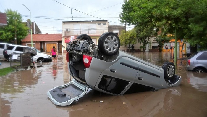 A damaged car is seen during floodings in the city of Bahia Blanca, in the province of Buenos Aires, Argentina March 7, 2025. REUTERS/Juan Sebastian Lobos
