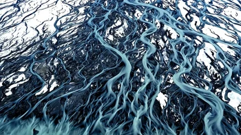 Karya Stuart Chape Pemenang Natural Landscape. “Pemandangan udara dari helikopter ke perairan biru glasial Sungai Tasman yang mengalir ke Danau Pukaki dari pegunungan tinggi Taman Nasional Aoraki-Mount Cook, Selandia Baru.” Foto: The Nature Photography Contest