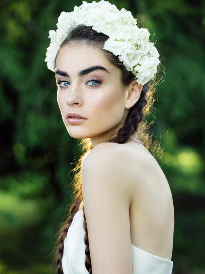 Beautiful bride on a background of summer forest