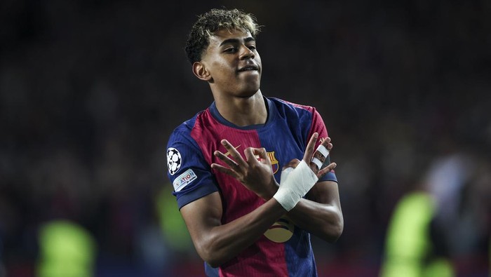 Barcelona, Spain - March 11: Lamine Yamal of FC Barcelona celebrates after scoring a goal, during the UEFA Champions League 2024/25 Round of 16 Second Leg match between FC Barcelona and SL Benfica at Estadi Olímpic Lluís Companys on March 11, 2025 in Barcelona, Spain. (Photo by Xavi Bonilla/DeFodi Images via Getty Images)