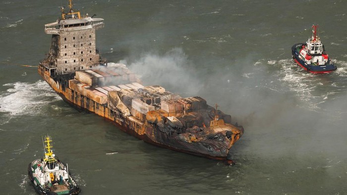 Smoke billows from the MV Solong cargo ship in the North Sea, off the Yorkshire coast, Tuesday, March 11, 2025, in England. (Dan Kitwood/Pool Photo via AP)