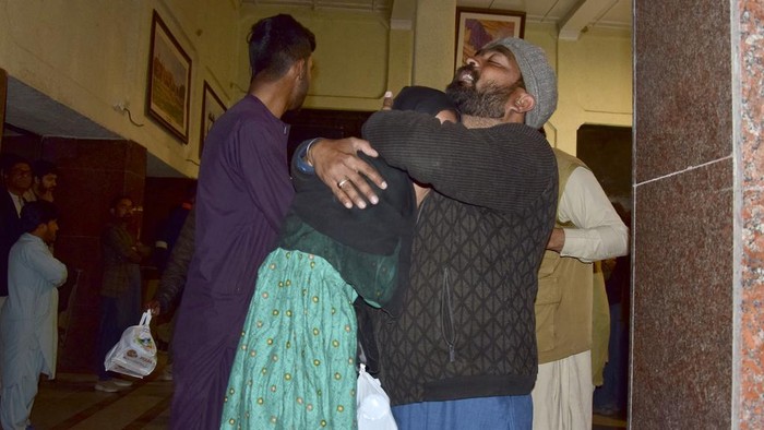 Passengers rescued by security forces from a passenger train attacked by insurgents arrive at a railway station in Quetta, Pakistan, Wednesday, March 12, 2025. (AP Photo/Arshad Butt)